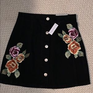 Black denim skirt